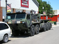 Photo: HEMETT transport vehicle of the Kansas National Guard parked in Atchison, Kansas.  This vehicle, which belongs to the 1st Battalion, 127th Field Artillery, was used to transport the 75mm saluting battery that participated in the Fourth of July celebration.