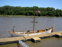 Photo: The “White” pirogue (similar in design to a Boston Whaler).