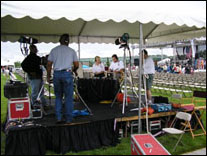 Photo: The showcase event of “A Journey Forth” in Kansas City, Missouri took place on 3 July in Berkley Riverfront Park.  Here we can see a local television news station preparing to broadcast the day’s events.