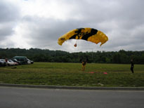 Photo: Jumpers gather up their parachutes at Berkley Park.