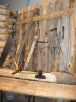 Photo: A museum display depicting some of the types of tools that Lewis and Clark's men used to build Camp River Dubois. 