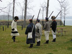 Photo: Another view of Jeffersonian interpreters maintaining their proficiency in drill. While marching in close formation in modern times is primarily used for ceremonial purposes, during the early nineteenth century the ability of commanders to quickly maneuver massed formations of infantrymen armed with smoothbore muskets often proved the difference between victory and defeat.