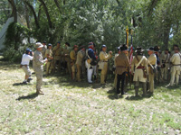 Photo:  Interpreters from the Montana’s Lewis and Clark Honor Guard also attended the Signature Event at Pompey’s Pillar.  Garbed in Jeffersonian-era U.S. Army uniforms, they previously appeared at the Great Falls Lewis and Clark event as well as numerous other local gatherings during the Bicentennial Commemoration.