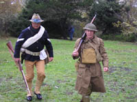 Photo: The reenactors at the opening ceremony did not confine themselves to the Lewis and Clark expedition, but also portrayed service-members from all of America's past conflicts.  Here we see a World War I "Doughboy" (right) and a Soldier who fought in Cuba during the Spanish-American War.