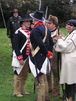 Photo: Reenactors in the garb of Jeffersonian Army Soldiers were present at the opening ceremonies.  The mix of Native American clothing and military garb accurately reflect the deteriorating condition of the expedition's military wardrobe. 