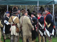 Photo: - Another view of Jeffersonian Army reenactors portraying members of the Lewis and Clark expedition.
