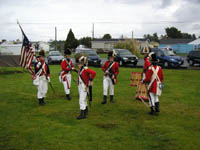 Photo: Members of the Lewis and Clark Fife and Drum Corps at Long Beach, WA.
