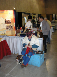 Photo: U.S. Army Corps of Engineers employees garbed in period clothing at the Great Falls fairgrounds exhibit.  The gentleman dressed in gray and black is wearing the uniform of a newly recruited member of the expedition while the other is dressed as engagé Pierre Cruzatte.