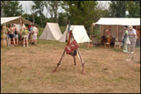 Photo: The 'encampment' of the St. Charles Corps of Discovery at Boyer Chute National Wildlife Refuge, a satellite location of the 'First Council' Lewis and Clark signature event, July 31-August 3, 2004.  With their pirogues beached nearby and open for visitor inspection, the members of the St. Charles Corps of Discovery accurately portrayed the original Corps with 1804 military dress and drill