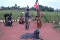 Photo: Life-size statues commemorate and interpret the 'First Council' between Captains Lewis and Clark of the Corps of Discovery and chiefs of the Oto and Missouria Indian nations on August 3, 1804.  This exhibit is located at the Fort Atkinson State Historic Park in Fort Calhoun, Nebraska, on the site of the 'Council Bluff' where the historic meeting took place.  The realistic representation depicts Captains Lewis and Clark in full-dress military uniforms, assisted by a trader-interpreter named Fairfong (or Fairlong) and Clark’s Labrador dog 'Seaman,' and the Indian sachems Shon go ton go, We the a and Shon guss can in full tribal regalia.