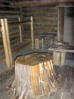 Photo: The expedition ingeniously used the stump of one of the large trees as a desk in the enlisted quarters. 