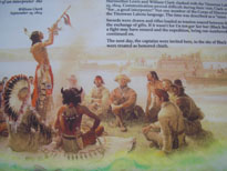 Photo: One of the historical markers along the expedition’s trail that incorrectly depicts them in buckskins.  It is evident from Lewis’ account that the Corps of Discovery wore their full dress military uniforms to the meeting with the Sioux.  Later on, these uniforms wore out and the expedition donned Indian style buckskins, but that would not occur for another year or so.