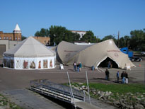 Photo: National Park Service’s “Tent of Many Voices” at Fort Pierre, South Dakota.  This is one component of the Corps of Discovery II, a traveling exhibit commemorating the Lewis and Clark expedition as well as the Indian cultures that they came into contact with during their trip to and from the Pacific Northwest.