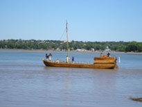 Photo: The replica keelboat (usually called a “barge” to Lewis and Clark) appears at the mouth of the Bad River on 24 September 2004.