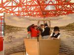 Photo: On the U.S. Army Corps of Engineers traveling display, young visitors can try on period uniforms and get their pictures taken in a replica of the bow section of Lewis and Clark's keelboat.