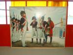 Photo: Interior shot of COE traveling display. This is one of the five paintings by artist Michael Haynes commissioned by the Corps of Engineers to commemorate the expedition. This scene shows Lewis and Clark recruiting additional volunteers from the garrison of Fort Kaskaskia, Illinois Territory.