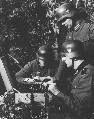 Photo:  German troops use the Enigma in the field