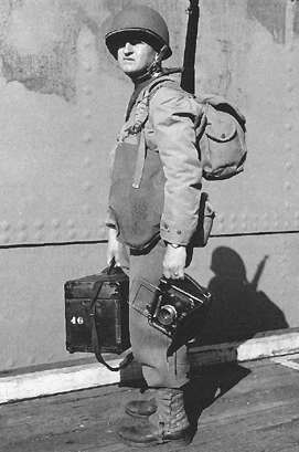 Photo:  Signal Corps photographic technician in full regalia