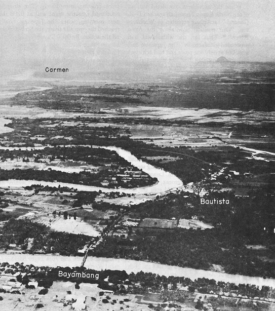 Photo:  Agno River between Bayambang and Carmen. Bayambang, foreground, stretches along the southwestern bank of the river.