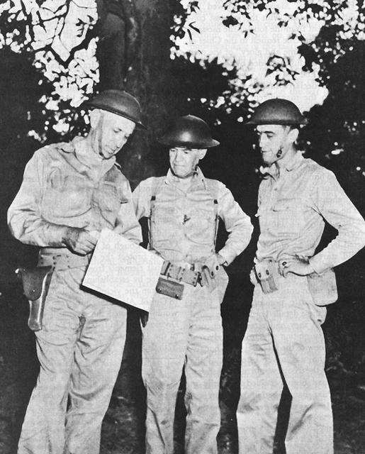 Photo:  Brig. Gen. Maxon S. Lough, left, with Col. Harrison C. Browne (CofS Phil Div) and Capt. Joseph B. Sallee (ADC), near the front lines