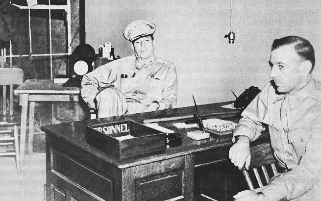 Photo:  USAFFE Headquarters in Malinta Tunnel.  General MacArthur with General Sutherland, March 1942