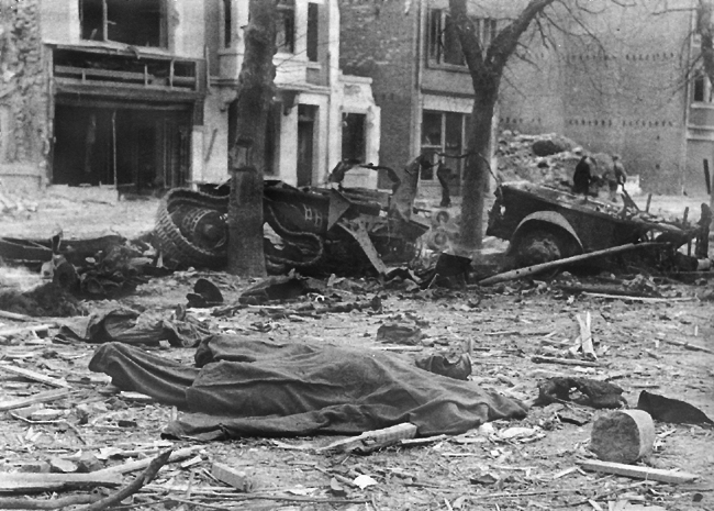 Photo:  A Bastogne street after Luftwaffe bombardment