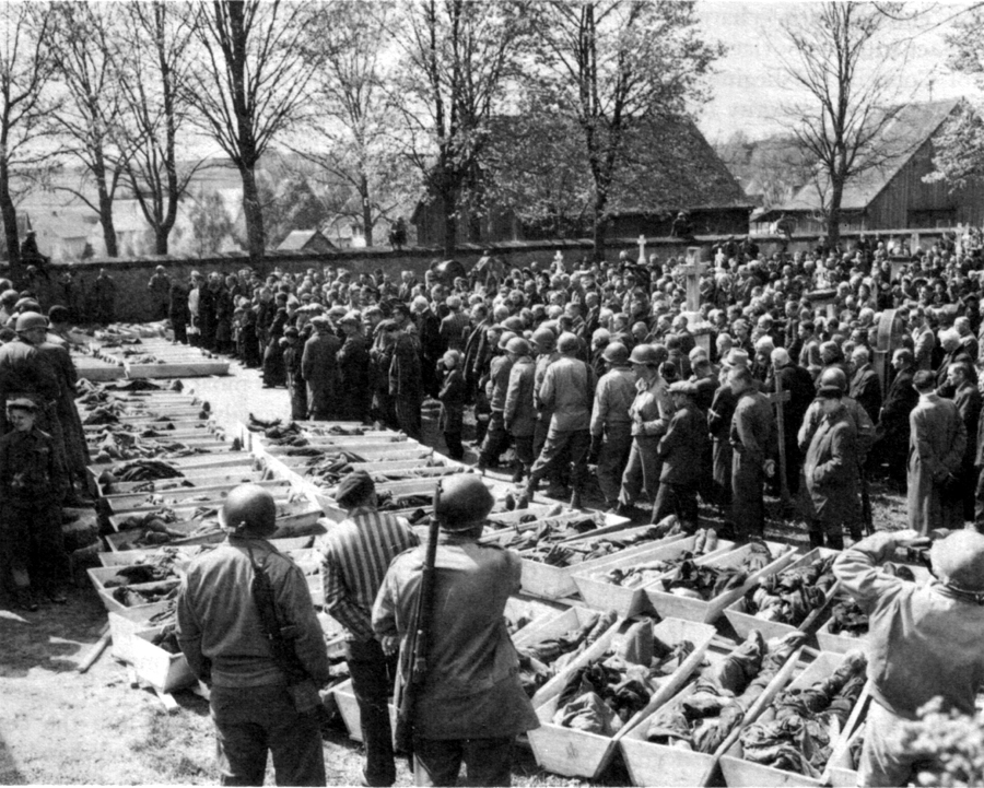 MASS FUNERAL for concentration camp prisoners murdered by their guards in the last days of the war.