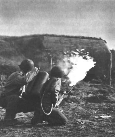 Photo: Practicing Flame Thrower Technique for reducing pillboxes.