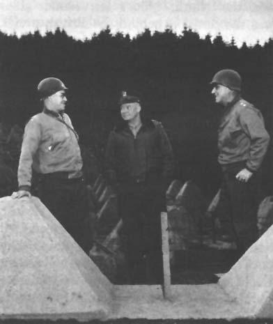 Photo: Generals Bradley, Eisenhower, and Gerow making a front line inspection early in November.