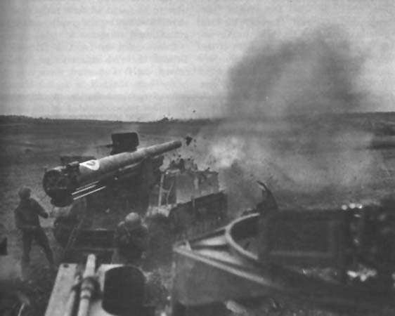 Photo: 155 mm. Self Propelled Gun bombarding Gressenich.