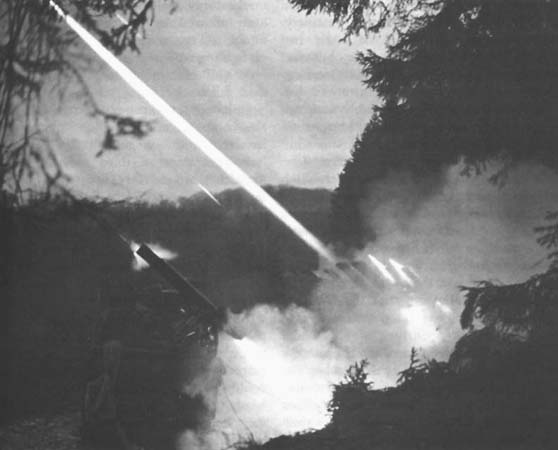 Photo: V Corps Rocket Launchers bombarding German Positions.