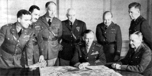 Photo - MEMBERS OF THE WAR DEPARTMENT GENERAL STAFF Left to right: Brig. Gen. Leonard T. Gerow, Briy. Gen. R. A. Wheeler, Briy. Gen. S. :Miles, Maj. Gen. H. H. Arnold, General Marshall, Brig. Gen. W. H. Haislip, Brig. Gen. H. L. Twaddle, and Maj. Gen. W. Bryden. (Maj. Gen. R. C. Moore does not appear in photo.)
