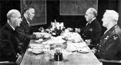 Photo - THE U. S. JOINT CHIEFS OF STAFF at a luncheon meeting, October- 1942, Left to right: Admiral Kin, General Marshall, Admiral William D. Leahy. and General Arnold.