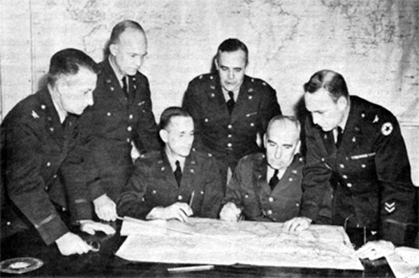 Photo - WAR PLANS DIVISION, March 1942. Left to right: Col. St. Clair Streett; General Eisenhower, Chief; Col. A. S. Nevins; Brig. Gen. R. IV. Crawford; Col. C. A. Russell; and Col. H. A. Barber, Jr.
