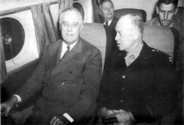 ABOARD THE PRESIDENTS PLANE. General Eisenhower with Mr. Roosevelt on the flight from Oran to Tunis, 20 November 1943. 