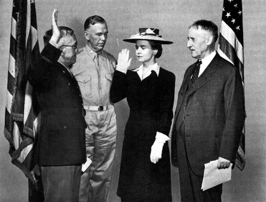 MRS. OVETA CULP HOBBY is sworn in as the first Waac by Maj. Gen. Myron C. Cramer. General Marshall, second from left, and Secretary of War Henry L. Stimson were among witnesses of the ceremony.