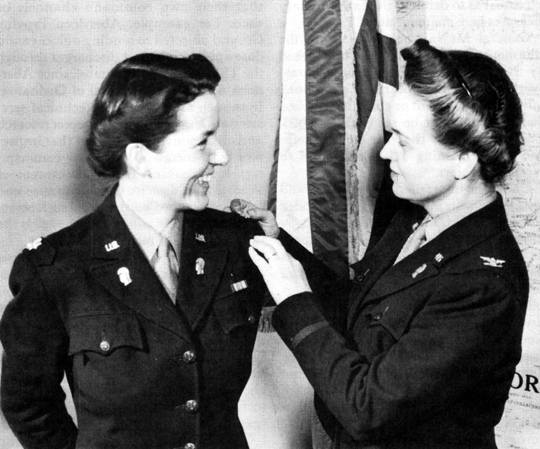 MAJ. BETTY BANDEL receives her leaves from Colonel Hobby.