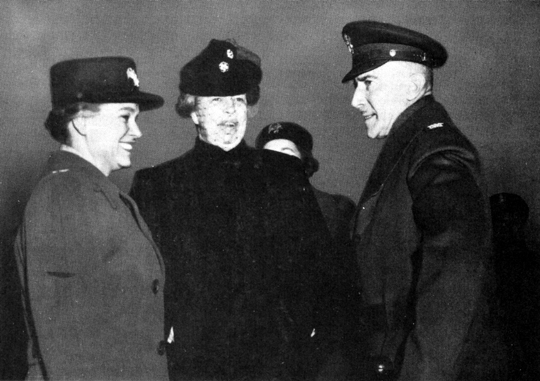 THE PRESIDENT AND MRS. FRANKLIN D. ROOSEVELT visit the Waacs in the spring of 1943. Mrs. Roosevelt with Director Hobby and Col. John A. Hoag, commandant of First WAAC Training Center at Fort Des Moines.