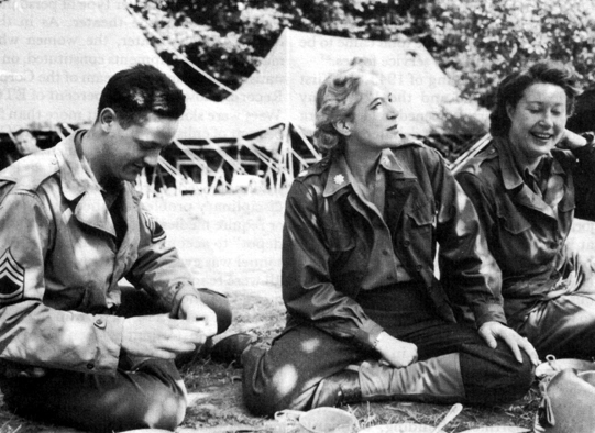 LT. COL. ANNA W WILSON, WAC Staff Director, European theater, lunches in the field in France, 1 August 1944.