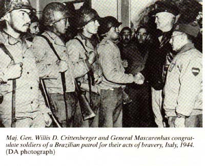 Maj. Gen. Willis D. Crittenberger and General Mascarenhas congradulate soldiers of a Brazilian patrol for their acts of bravery, Italy, 1944.