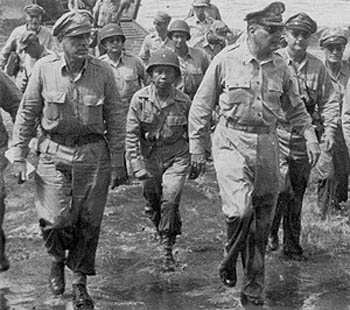 General MacArthur wades ashore in the 24th Infantry Division sector, 20 October 1944