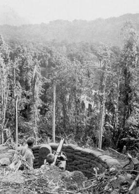 Machine gun crew awaits the Japanese attack on Bougainville.