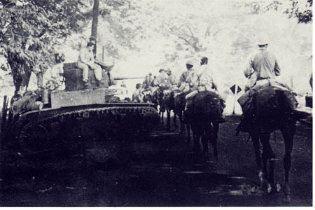 Members of the 26th Cavalry, Philippine Scouts move into Pangasinan Province, Luzon.