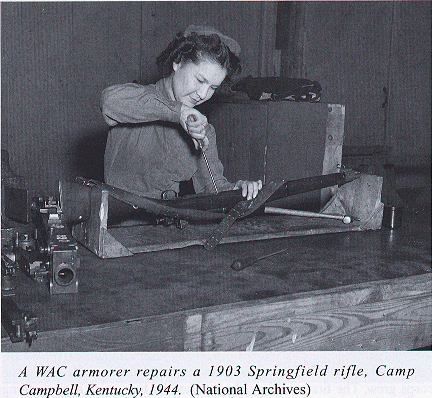 A WAC armorer repairs a 1903 Springfield rifle, Camp Campbell, Kentucky, 1944.