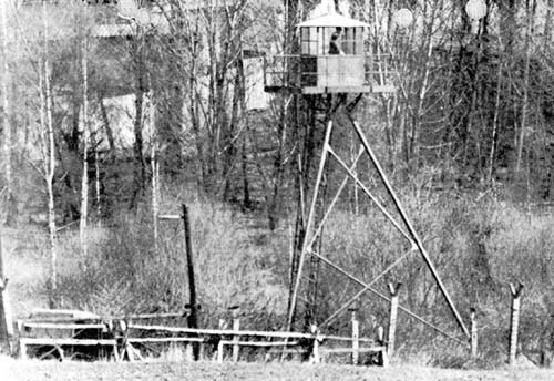 Photo: A Czechoslovak steel 3-legged watchtower.