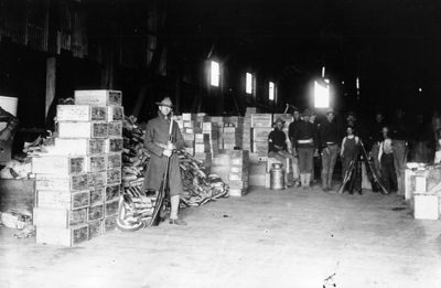 Photo:  SC95176 - Soldiers guarding relief supplies in San Francisco after the earthquake.
