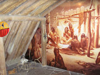 Photo: Painting depicting the interior view of an earth lodge.