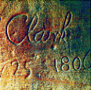 Photograph: Clark names the landmark shown below Pompy's Tower, after Sacagawea's son. While there he carved his name into the stone. This signature is the only physical remnant of the Expedition remaining along the trail. Photo courtesy of the Bureau of Land Management, Billings, Montana.